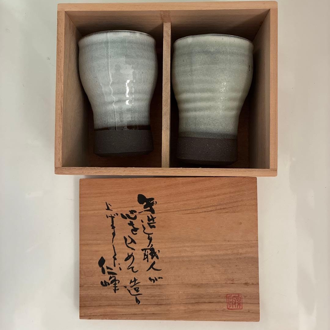 Set of 2 ceramic teacups with wave pattern